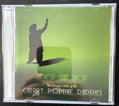 Cherry Poppin' Daddies – Zoot Suit Riot: The Swingin' Hits Of The Cherry Poppin' Daddies (CD, Compilation, 1997, Mojo Records UD-53081) - Maple City Music